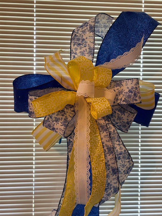 Side view of Chinoiserie and Sunshine bow showing full loops and flowing tails