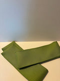 Olive green solid wired ribbon in 4 inch width showing smooth matte finish
