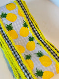 4 inch pineapple wired ribbon with black and white gingham trim and yellow wired edges