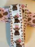 Highland cow ribbon bundle showing cow print and pink cow print wired ribbon